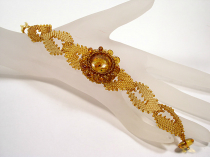 Роскошный плетеный браслет из натурального балтийского янтаря 20027